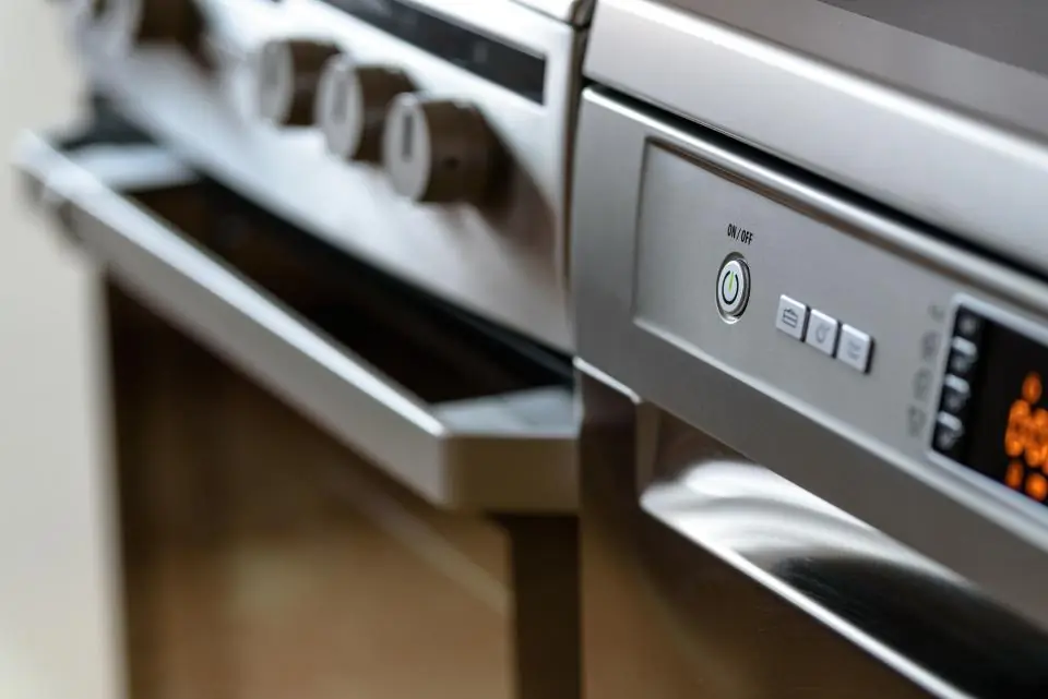 Stainless steel oven and range in a home kitchen
