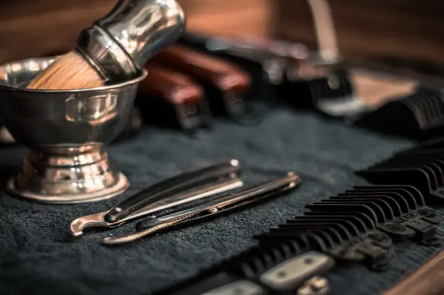 Shaving brush, razor and bowl on a barber's tray