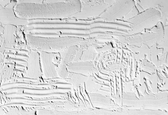 Close-up of hand-troweled plaster texture