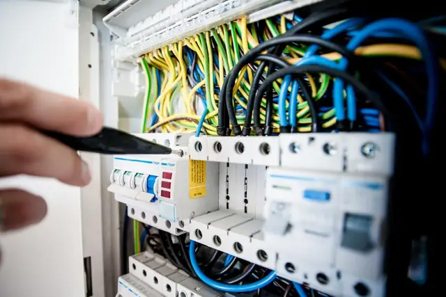 Close-up of breakers and wiring in a panel