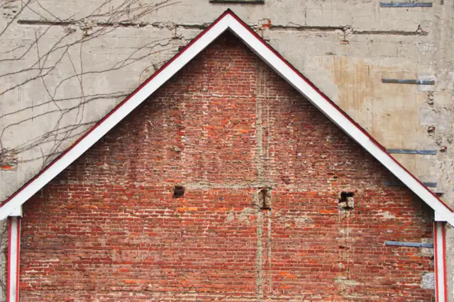 Brick gable with white trim