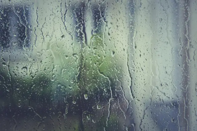 Rain running down a window