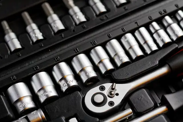 Socket set and ratchet laid out in a tool tray