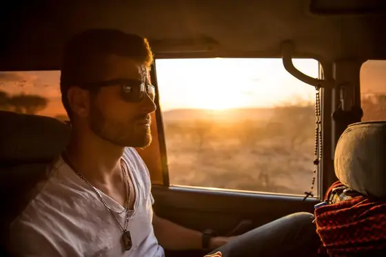 Jamal at the wheel of the moving truck