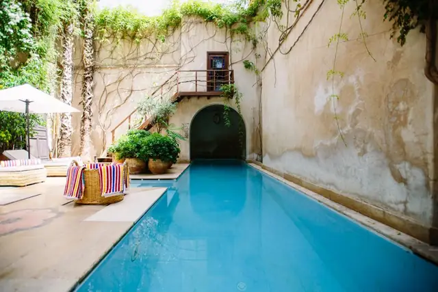 Clear blue swimming pool in a courtyard