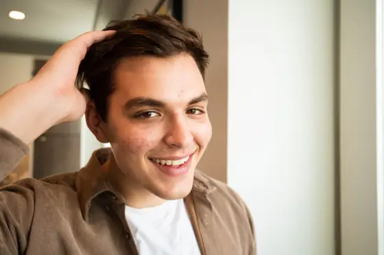 Nate smiling at home