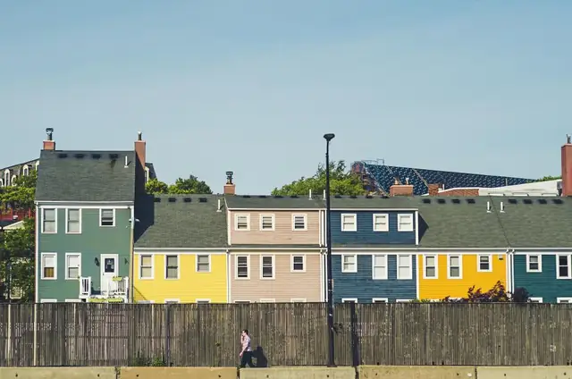 Row of colorful houses with pitched roofs
