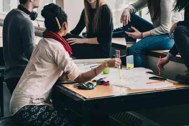 Group of students studying together at a table