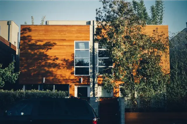 Modern house with wood panels and large windows